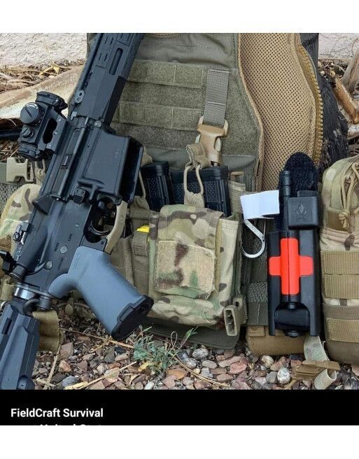 fieldcraft survival tourniquet holder ( red cross